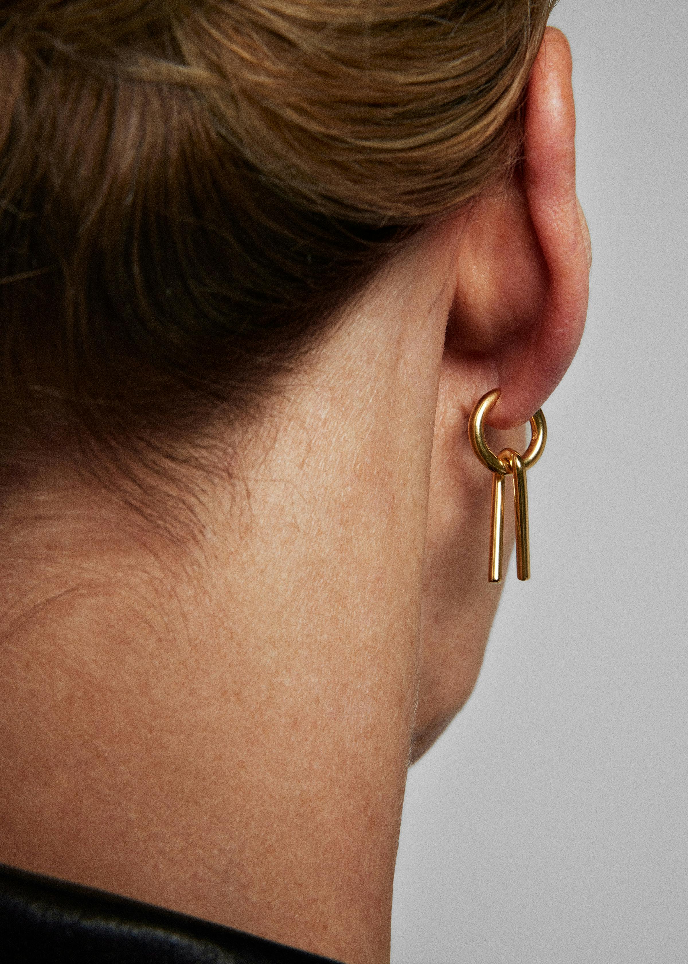 System earring clip