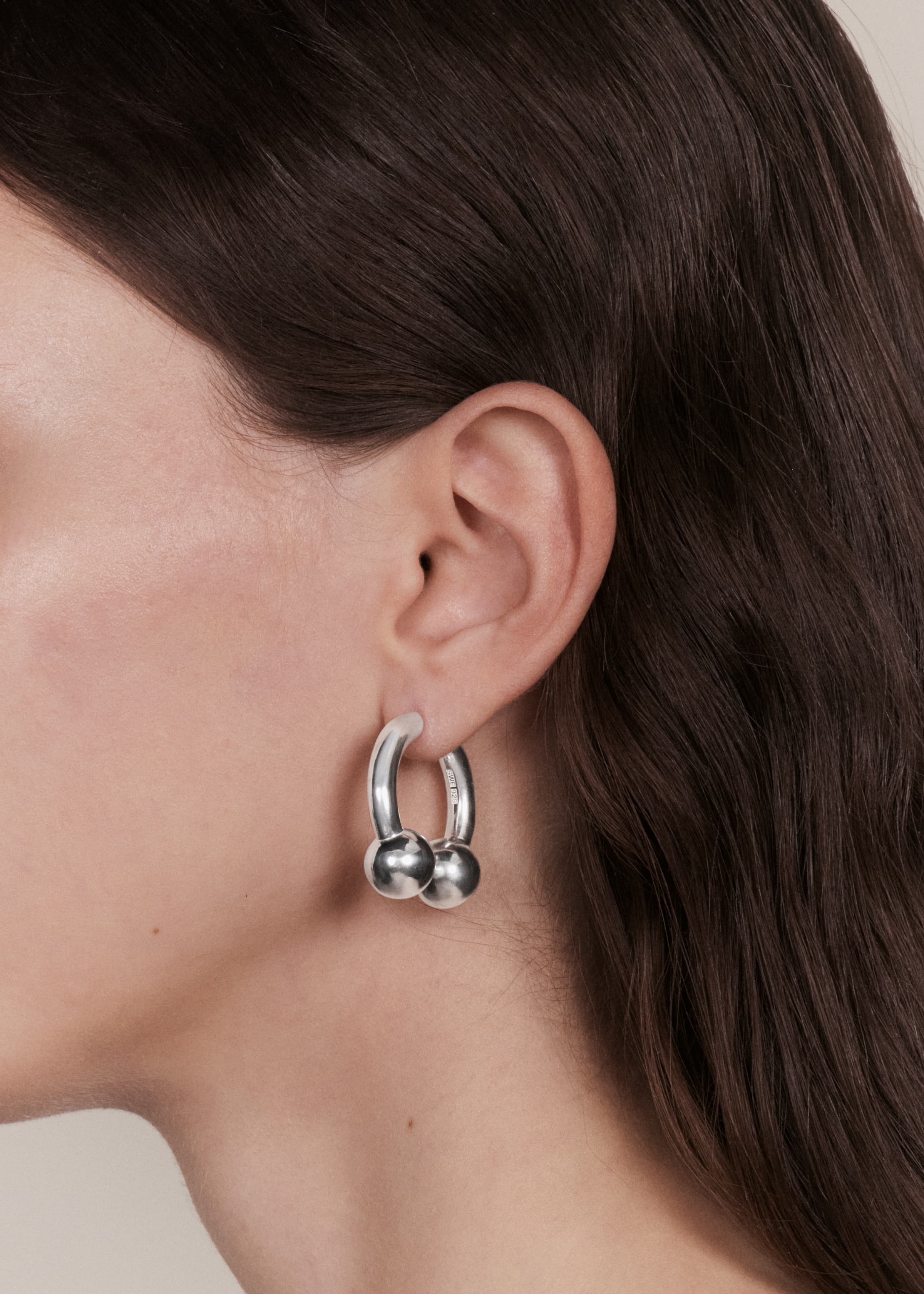 Pearl earrings split